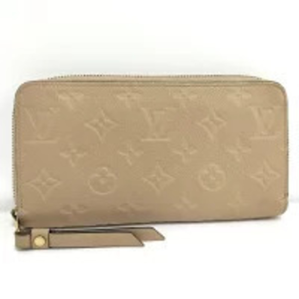 LOUIS VUITTON Zippy Wallet Monogram Empreinte Tourtrell Beige Cream